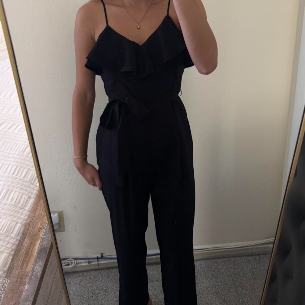NWOT BANANA REPUBLIC Black jumpsuit with ruffle top and belt.